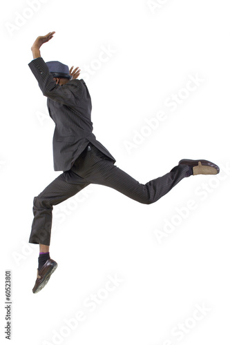 Photo: young black businessman leaping / jumping high young black businessman leaping / jumping high