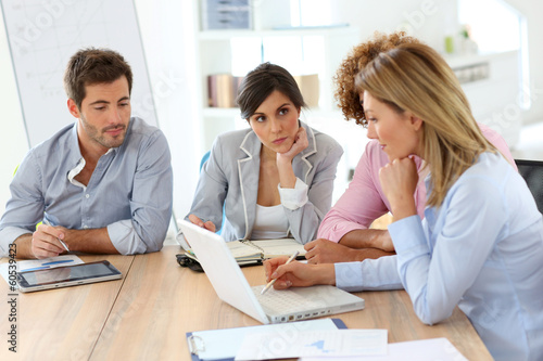 Photo: Young business people in a meeting Young business people in a meeting
