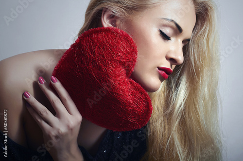 Photo: Lovely Beautiful Blond Woman with Red Heart. Beauty Girl Lovely Beautiful Blond Woman with Red Heart. Beauty Girl