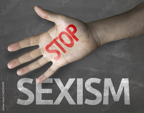 Photo: Educational composition with a hand painted Stop Sexism Educational composition with a hand painted Stop Sexism
