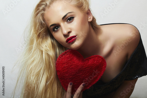 Photo: Sexy Beautiful Blond Woman with Red Heart.Valentine's Day Sexy Beautiful Blond Woman with Red Heart.Valentine's Day