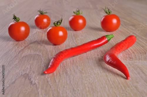 Photo: Tomatoes and red hot peppers Tomatoes and red hot peppers