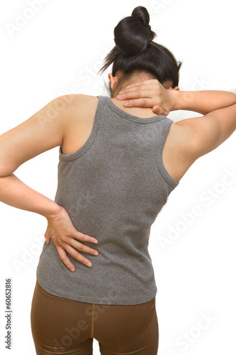 Photo: Attractive female suffers from backache and neck pain Attractive female suffers from backache and neck pain