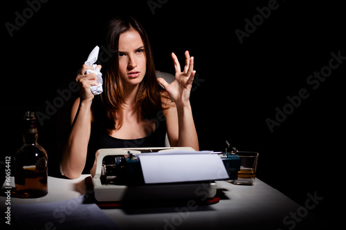 Photo: Novelist is angry and frustrated because she's having a writer's Novelist is angry and frustrated because she's having a writer's