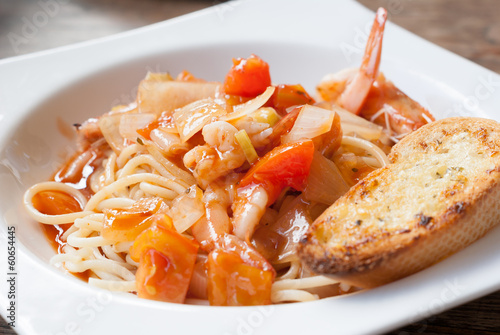 Photo: plate of spaghetti and tomato sauce plate of spaghetti and tomato sauce