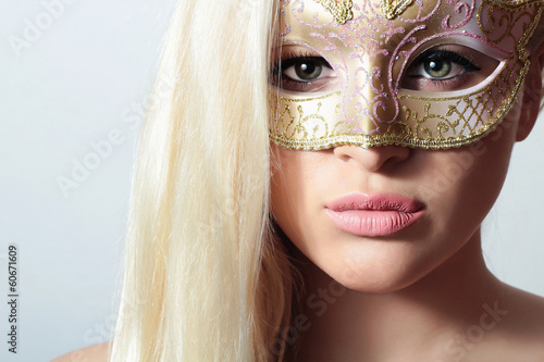 Photo: Beautiful Blond Woman in Carnival Mask.Masquerade.Sexy Girl Beautiful Blond Woman in Carnival Mask.Masquerade.Sexy Girl