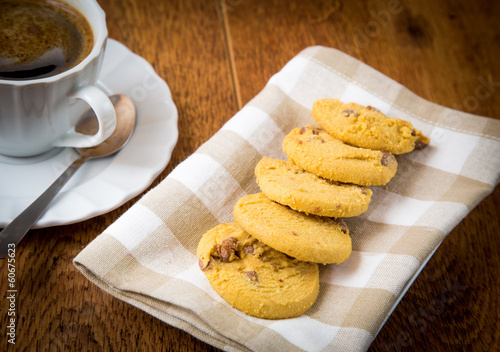 Photo: cup of coffee with butter biscuits with chocolate chips cup of coffee with butter biscuits with chocolate chips