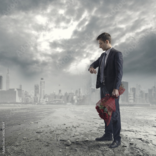 Photo: Man waiting with roses Man waiting with roses
