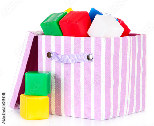 Photo: Textile box with bright blocks, isolated on white Textile box with bright blocks, isolated on white