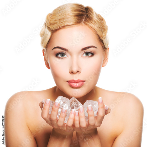 Photo: Beautiful young woman with ice in her hands Beautiful young woman with ice in her hands
