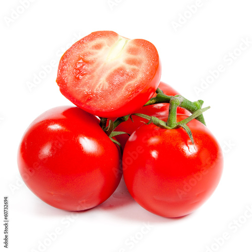 Photo: Fresh tomatoes isolated on white Fresh tomatoes isolated on white
