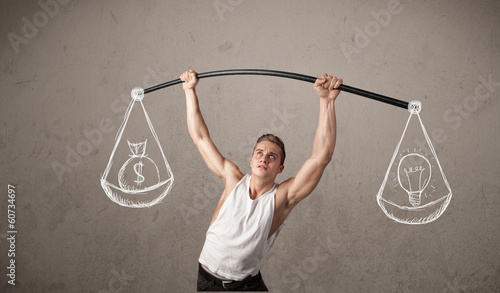 Photo: muscular man trying to get balanced muscular man trying to get balanced
