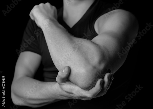 Photo: Pain in the elbow joint Pain in the elbow joint