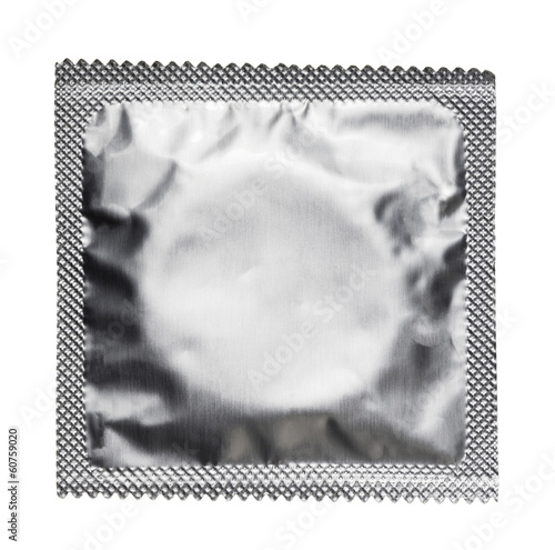 Photo: Condom isolated on white background Condom isolated on white background