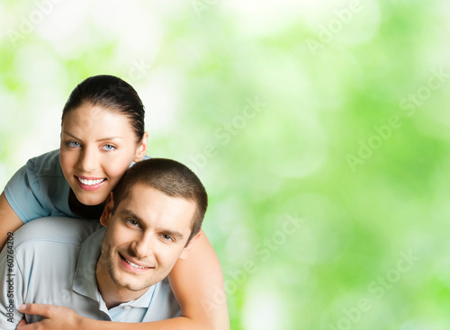 Photo: Portrait of happy couple, outdoors Portrait of happy couple, outdoors