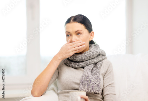 Photo: ill woman with flu at home ill woman with flu at home