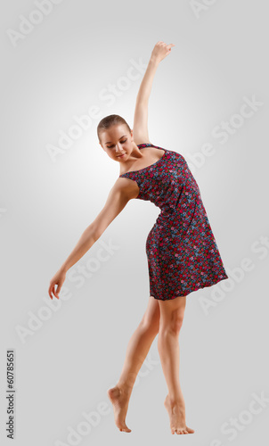 Photo: Girl in color dress dancing Girl in color dress dancing