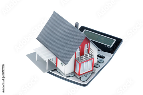 Photo: residential house on calculator residential house on calculator