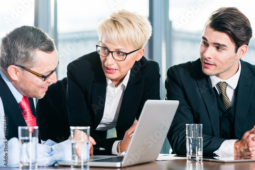 Photo: Business - meeting in office, people working with document Business - meeting in office, people working with document