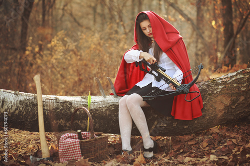 Photo: Little red riding hood with a crossbow Little red riding hood with a crossbow
