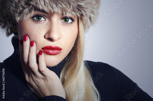 Photo: Beautiful Blond Woman in Fur.Girl with Green Eyes and Red Lips Beautiful Blond Woman in Fur.Girl with Green Eyes and Red Lips