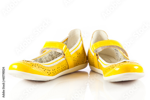 Photo: girl shoes isolated on white. girl shoes isolated on white.