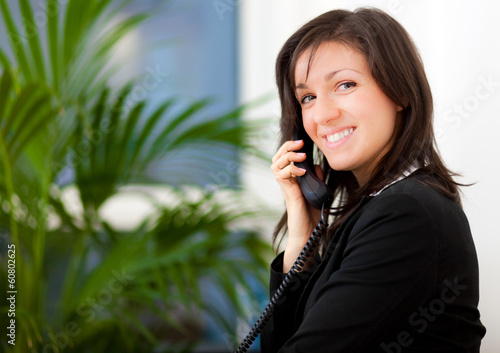 Photo: Businesswoman at the phone Businesswoman at the phone