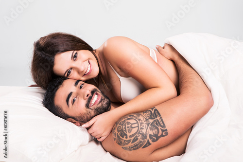 Photo: Love couple in bed Love couple in bed