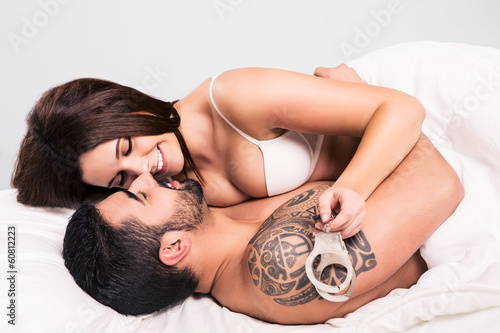 Photo: Love couple in bed Love couple in bed