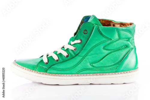 Photo: green sneakers isolated on white background green sneakers isolated on white background