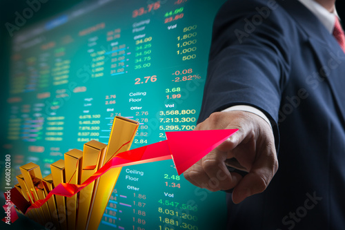Illustration: Business man point to up graph of stock market Business man point to up graph of stock market