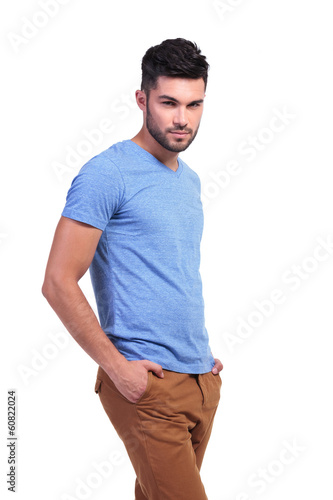 Photo: smiling casual man with hands in pockets smiling casual man with hands in pockets