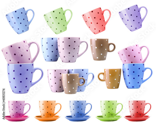 Photo: Colorful cups isolated on white Colorful cups isolated on white