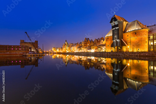 Photo: Old town of Gdansk with ancient crane at night, Poland Old town of Gdansk with ancient crane at night, Poland