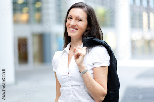 Photo: Smiling businesswoman outdoor Smiling businesswoman outdoor