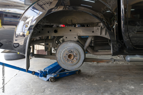 Photo: Rear drum brake assembly on car Rear drum brake assembly on car