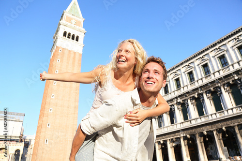 Photo: Romantic couple in love having fun in Venice Romantic couple in love having fun in Venice