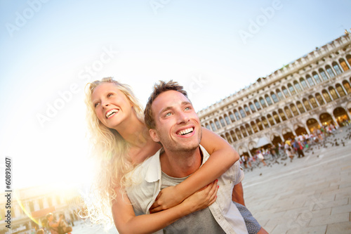 Photo: Travel couple in love having fun Venice romance Travel couple in love having fun Venice romance