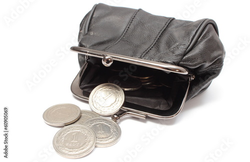 Photo: Black leather purse with silver coins. Black leather purse with silver coins.