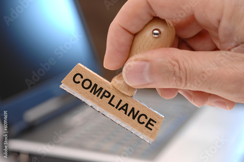 Photo: compliance marked on rubber stamp compliance marked on rubber stamp