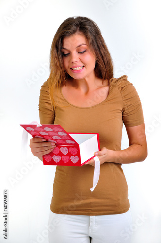Photo: surprised woman with present surprised woman with present