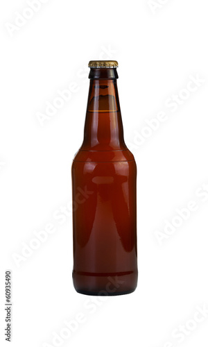 Photo: Unopened Bottle of Beer Isolated on White Unopened Bottle of Beer Isolated on White