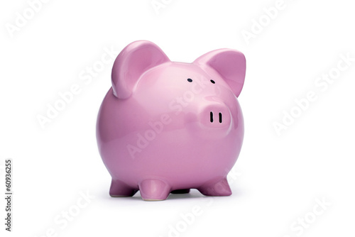 Photo: Little pink piggy bank on white Little pink piggy bank on white