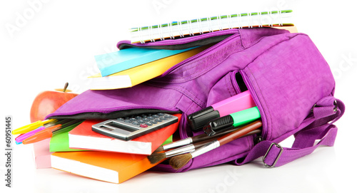 Photo: Purple backpack with school supplies isolated on white Purple backpack with school supplies isolated on white