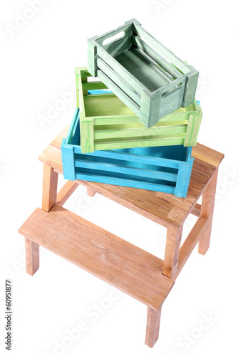 Photo: Empty wooden boxes on small ladder, isolated on white Empty wooden boxes on small ladder, isolated on white