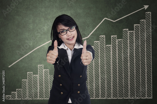 Photo: Woman showing thumbs up Woman showing thumbs up