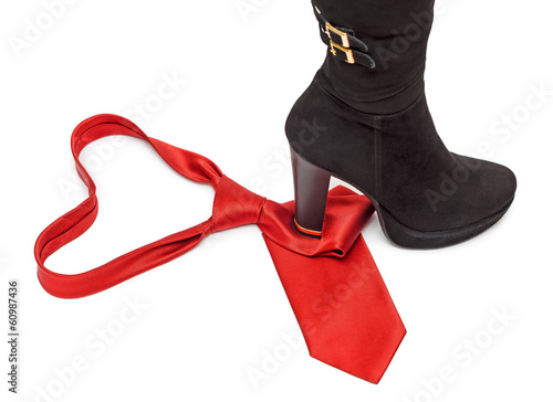 Photo: Boot steps on a necktie Boot steps on a necktie
