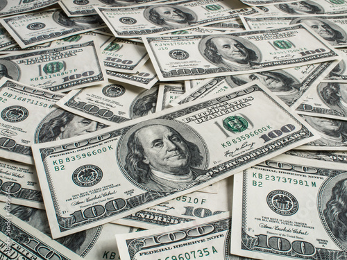 Photo: hundred dollars heap hundred dollars heap