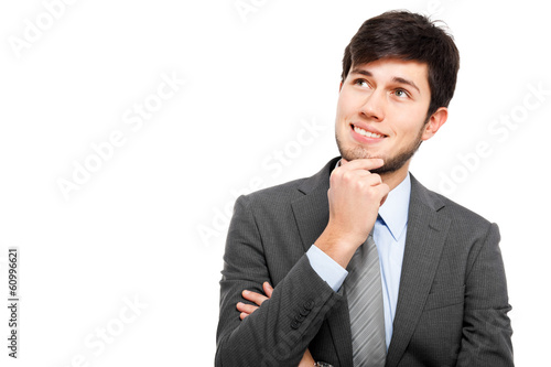 Photo: Thoughtful businessman isolated on white Thoughtful businessman isolated on white