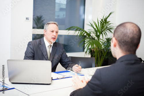 Photo: People talking about business People talking about business